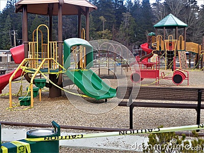 Closed Playground Wrapped in Caution Tape due to Corona Virus Pandemic Editorial Stock Photo