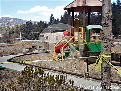Closed Playground Wrapped in Caution Tape due to Corona Virus Pandemic 2 Editorial Stock Photo
