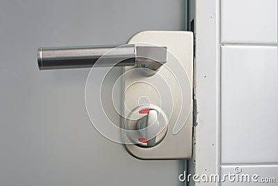 Closed toilet door Stock Photo