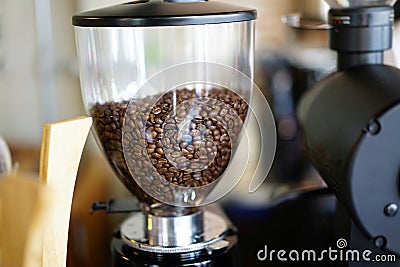 Closed up coffee beans in blender Stock Photo