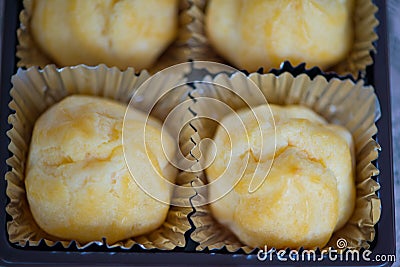 Closed up Eclair bakery in tray Stock Photo