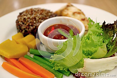 Closed Up Fresh and Boiled Vegetables with Spicy Shrimp Paste Dip, Thai Food Traditional Side Dish Stock Photo