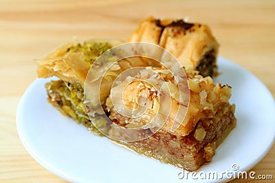 Closed up Mouthwatering Baklava Pastries Served on White Plate Stock Photo