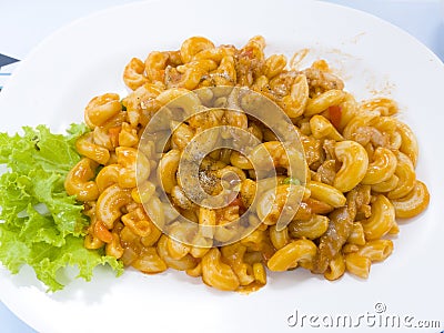 Closed up stir fried macaroni with chicken Stock Photo