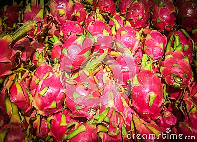 Closed up Vivid and Vibrant Dragon Fruit against for sale in a local food market Stock Photo