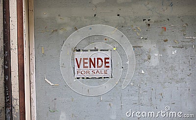 closed window of a bankrupt shop with the sign with the Italian Stock Photo