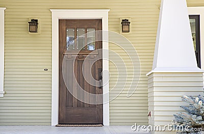 Closed wooden door of a home Stock Photo