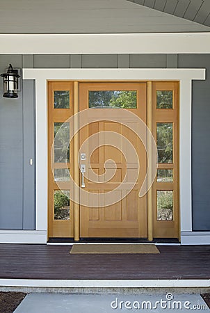 Closed wooden front door of a home Stock Photo