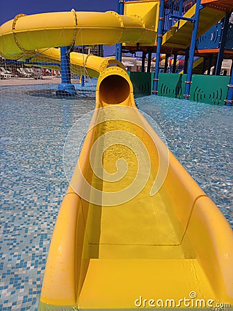 Closed yellow water slide on the background of the water park Editorial Stock Photo