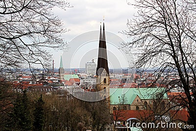 Closer view on the church steeple and the buildings around watched from the sparrenburg in bielefeld germany Editorial Stock Photo