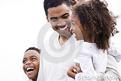 Closeup African-American father laughing with kids Stock Photo