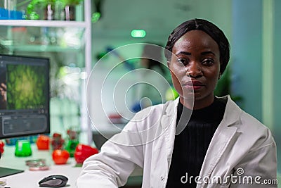 Closeup of african biologist woman looking into camera Stock Photo