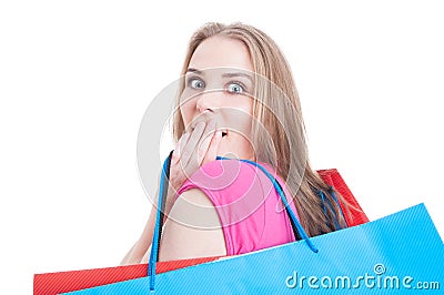 Closeup of amazed young girl with shopping bags Stock Photo