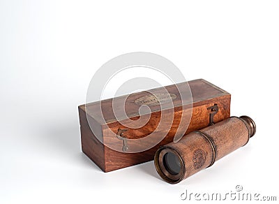 Closeup antique monocular telescope with wooden box isolated on white background, Illustrative Editorial Editorial Stock Photo