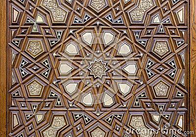 Closeup of arabesque ornaments of an old aged decorated wooden door, Cairo, Egypt Stock Photo