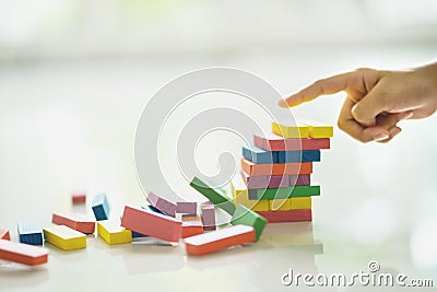 Closeup of asian kids hand playing wood blocks stack game Stock Photo
