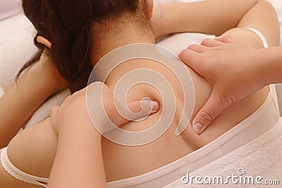 Closeup asian woman having deep massage Stock Photo