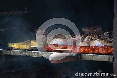 Closeup of assorted meat barbacue: pork, chicken and beef on the grill Stock Photo