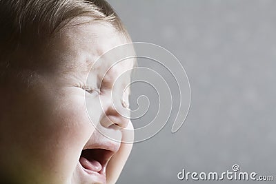 Closeup Of Baby Girl Crying Stock Photo