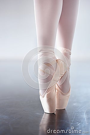 Closeup, ballerina and feet with training, balance and creative dance art in a studio. Zoom, female performer and dancer Stock Photo