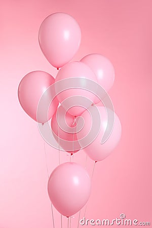 Closeup of balloons on pink background Stock Photo