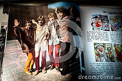 Closeup of Band Member Photography and Cartoon in Photo Book Included with The Beatles Magical Mystery Tour Vinyl Record Editorial Stock Photo