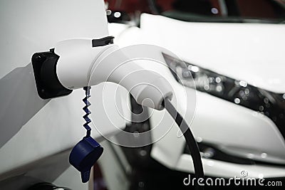 Closeup battery charger for electric car. EV Car or Electric car Stock Photo