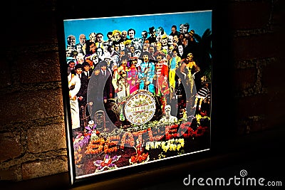 Closeup of The Beatles Sgt. Pepper's Lonely Hearts Club Band Vinyl Record Cover Leaning Against Brick Wall Editorial Stock Photo