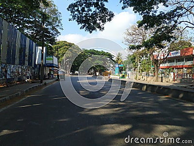 Closeup of Beautiful Asphalt Road view of Gorgunte Palya to Nandini Layout Bridge near Raj Kumar Samadhi, Outer Ring Road Editorial Stock Photo