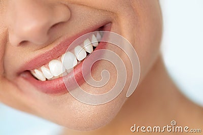 Closeup Of Beautiful Smile With White Teeth. Woman Mouth Smiling Stock Photo