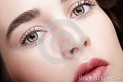 Closeup beauty macro face portrait of young woman. Brunette girl Stock Photo