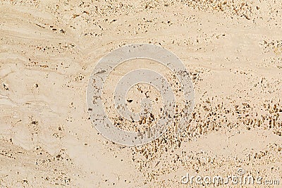 Closeup of beige porous stone textured wall Stock Photo