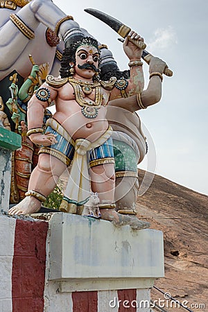 Closeup of belligerent Karuppana Sami deity. Editorial Stock Photo