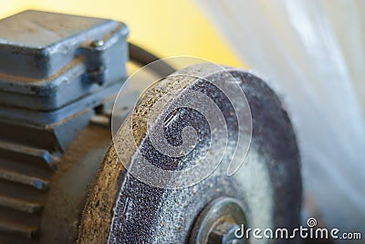 Closeup of bench grinder old wheel Stock Photo