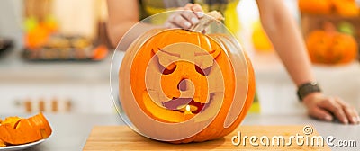 Closeup on big pumpkin Jack-O-Lantern with candle inside Stock Photo