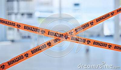 Closeup of biohazard tape blocking prohibited area. Caution tape is used as warning for quarantine hospital room. Toxic Stock Photo