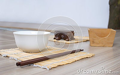 Chopsticks And Porcelain Bowl Stock Photo