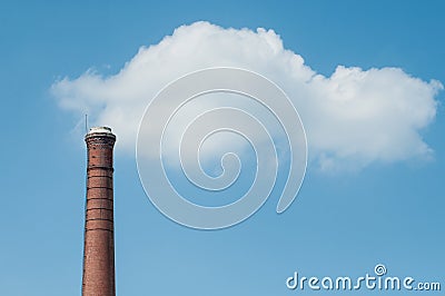 brick chimney factory on blue sky background white cl Stock Photo