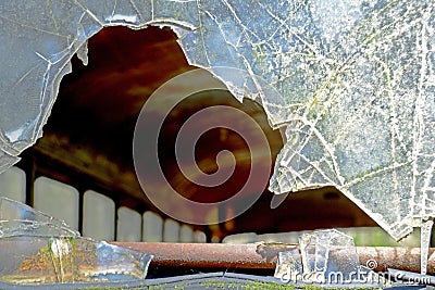 Closeup broken windshield in an abandoned bus. Stock Photo