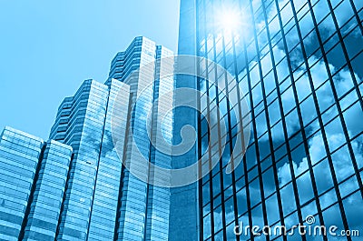 Closeup building glass of skyscrapers with cloud, Business conc Stock Photo