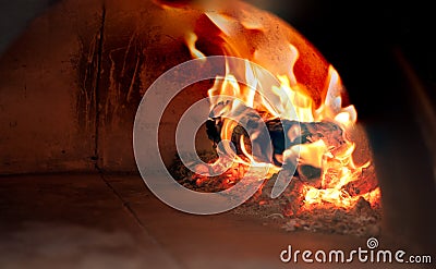 Closeup burning wood and charcoal in stove Stock Photo