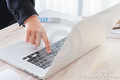 Closeup of business woman hand typing on laptop keyboard. Editorial Stock Photo