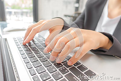 Closeup of business woman hand typing on laptop keyboard . Editorial Stock Photo