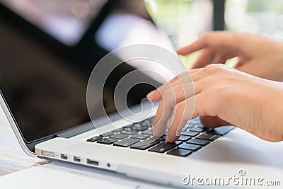 Closeup of business woman hand typing on laptop keyboard . Editorial Stock Photo