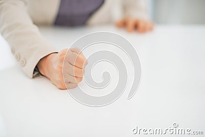 Closeup on business woman knocking on table Stock Photo