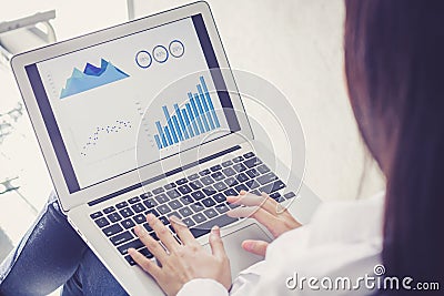 Closeup business woman work with finance analysis and planing data on laptop Stock Photo