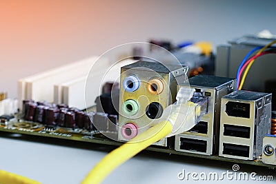 Closeup cable wire network connected to computer. Stock Photo