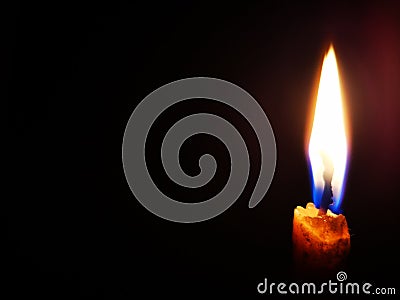 Closeup with candle light in the dark Stock Photo