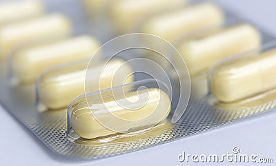 Closeup capsules and pills packed in blisters Stock Photo