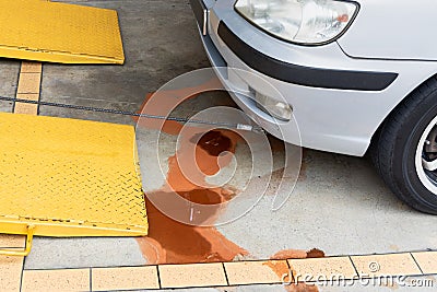 Closeup on car towed onto flatbed tow truck with cable Stock Photo